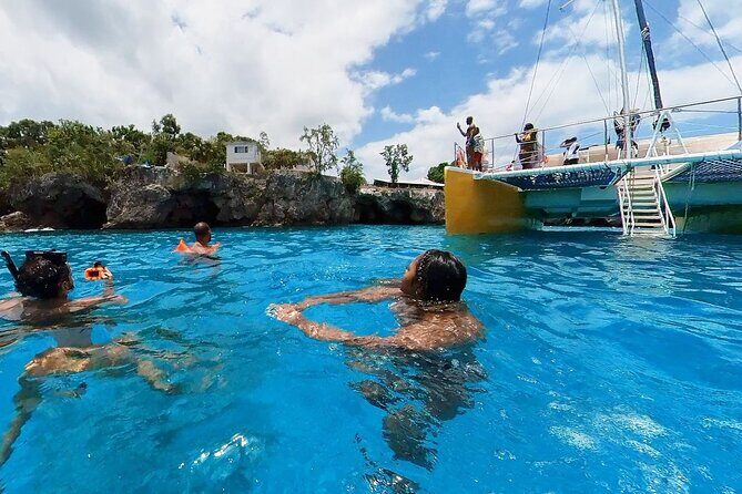 Party Catamaran Sunset Ricks Cafe Negril Open Bar and DJ - A Deep Dive into the Party Catamaran Experience