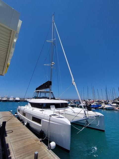 Pasito Blanco: Private Catamaran Excursion With Food & Drink - Highlights of the Experience