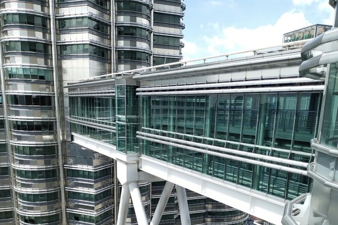 Petronas Twin Tower Skybridge View & Dining Experience Tour With Local Host - Pricing Details