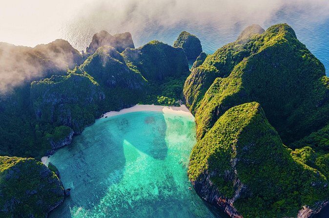 Phi Phi Islands Premium Speedboat Tour from Phuket with Lunch - Return Journey and Reflection