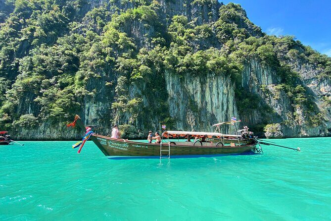 Phi Phi Sunset Longtail Boat Cruise to Maya Bay and Snorkeling - The Guide and Customer Service