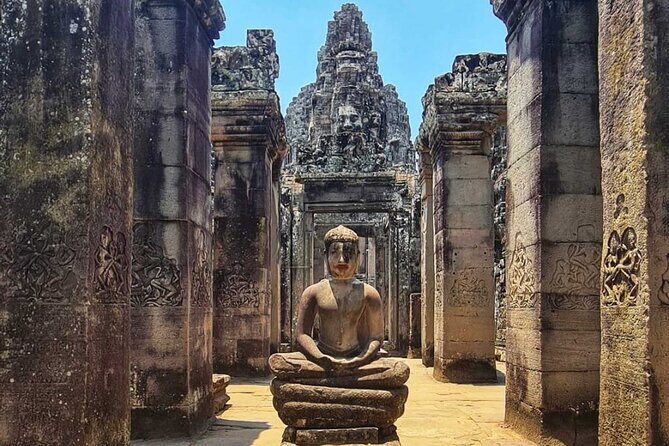 Phnom Penh to Angkor Wat Temples Park Day Tour Ticket and Lunch - Ta Prohm: Jungle Cloaked Mystique