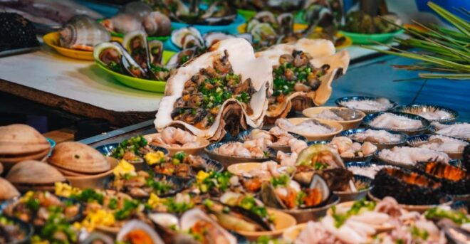 Phu Quoc Street Food Tour - Eat & Drink With Locals - Indulge in Traditional Vietnamese Dishes