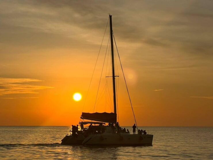 Phuket: Coral Island & Sunset Dinner by Sailing Catamaran - Tour Guide and Languages