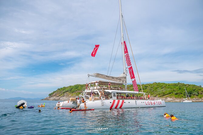 Phuket Racha Yai and Promthep Cape Sunset Dinner Yacht Cruise - Onboard Water Toy Activities