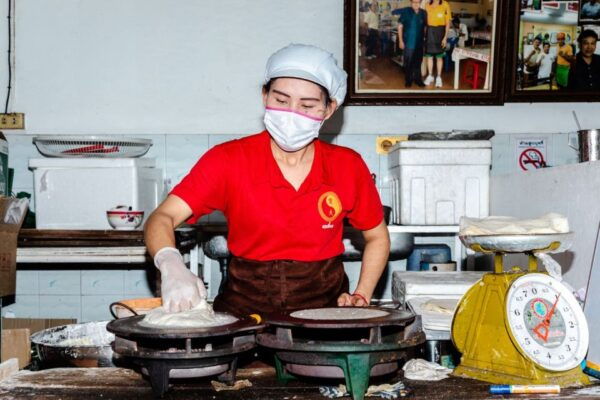Phuket: Southern Flavours Food Tour With 15 Tastings - Indoor Market With Fresh Spring Rolls and Pork Skewers