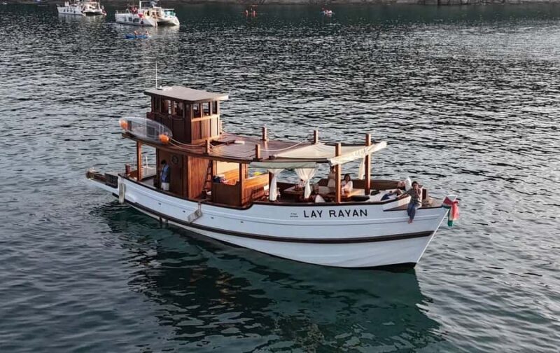 Phuket: Vintage Private Boat Tour with Snorkeling and Meals - An authentic day on the water—what to expect from this private boat experience