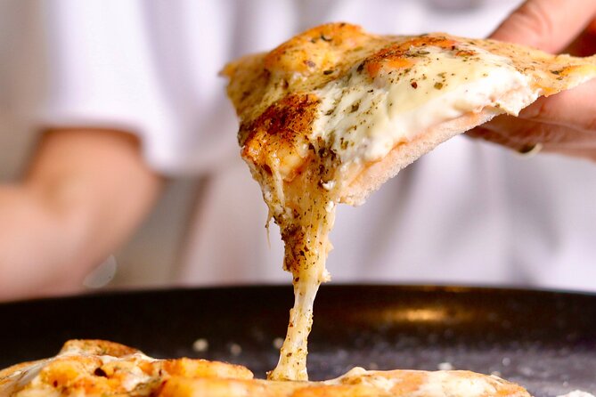 Pizza Cruise Along the Amsterdam Canals - Captivating Views of Amsterdam Landmarks