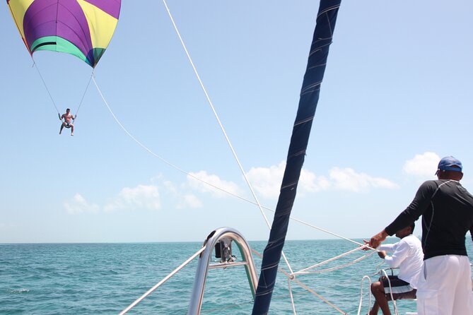 Plus Full Day Catamaran Tour to Isla Mujeres All Inclusive - Language Options and Booking Availability