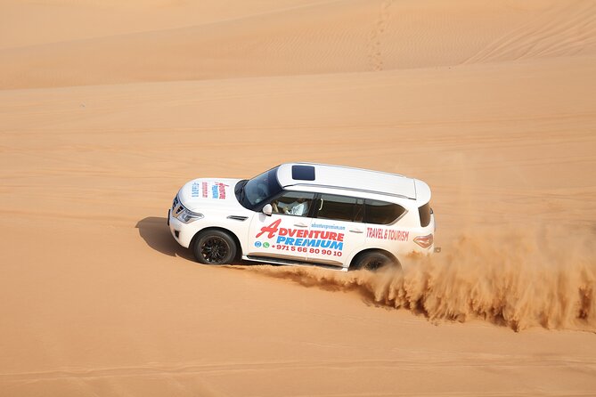 Polaris RZR 1000cc Self Drive 4 Seats Camel Ride and Sandboarding - The Sum Up