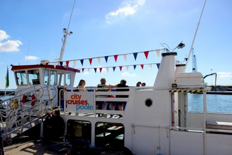 Poole: Harbor Dinner Cruise With Traditional Fish and Chips - Exploring Pooles Coastline