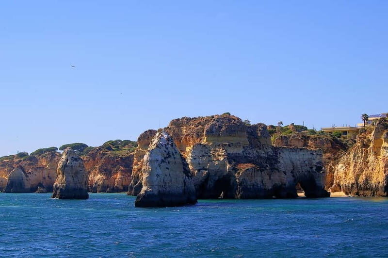 Portimão: Boat Trip by Sailing Boat to Lagos Cape Caves - Authentic Encounters and Unique Moments
