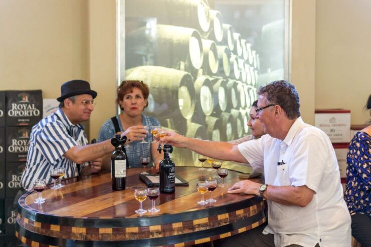Porto: Old Town Walking Tour Wine Cellar and Tastings - Meeting Point and Exchange Details
