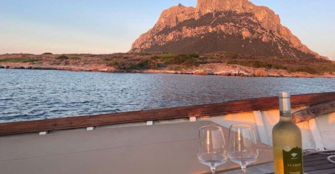 Porto San Paolo: Vintage Cruise Sunset Aperitif to Tavolara - Itinerary Details