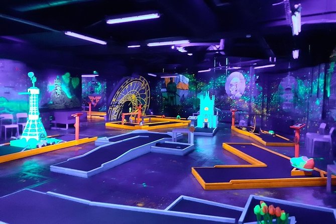 Prague Black Light Mini Golf and Games Tour Including Free Drinks - Tour Experience