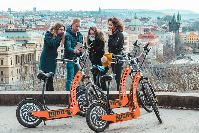 Prague E-scooter Sightseeing Small Group or Private Tour & Free Taxi Pick Up - Explore Pragues Iconic Landmarks on an E-scooter