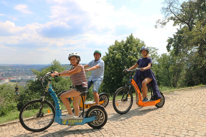 Prague: Electric Scooter & E-Bike Live Guided Tour - Tour Pricing and Meeting Point