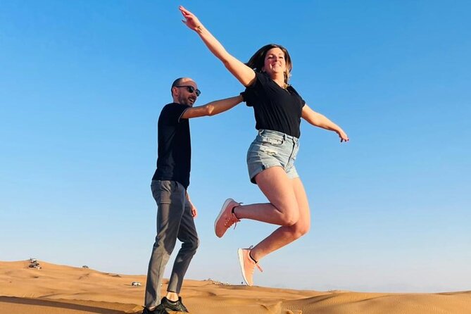 Premium Desert Safari Dubai Tour Package, BBQ Dinner, Sandboarding, Camel Ride - Experience Sandboarding and Camel Riding