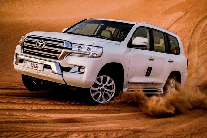 Premium Evening Desert Safari With Quad Bike, Camel Ride and BBQ Dinner - The Sum Up