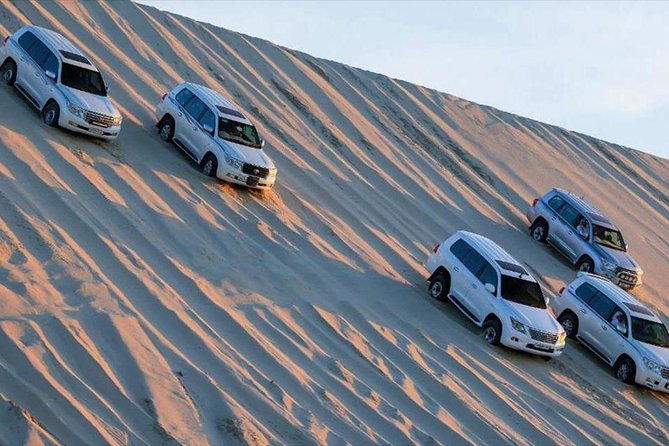 Premium Full-Day Safari, Dune Bash, Camel Ride and BBQ Meal in Desert Camp - The Sum Up
