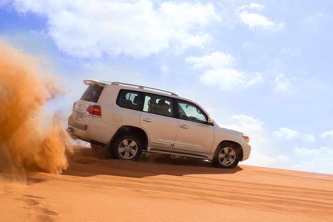 Premium Red Dune Safari With Camel Ride & BBQ Dinner in Bedouin Camp - Cancellation Policy