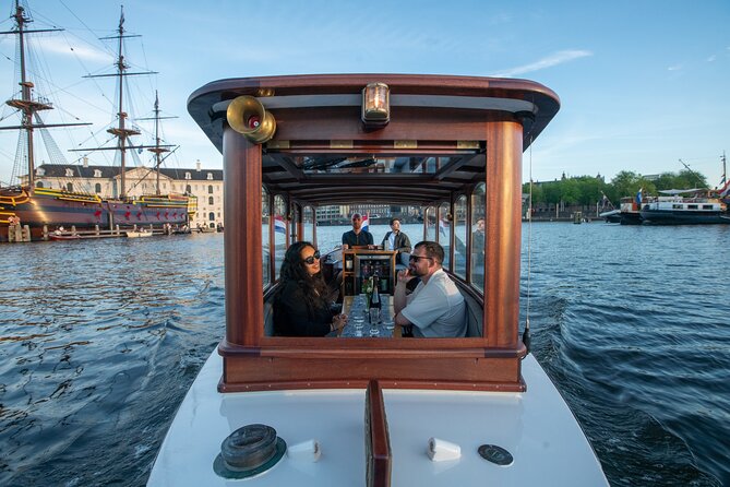 Private Boat Tour Amsterdam - 90 Min Incl. Welcome Drink on Historic Saloon Boat - Overview of the Experience