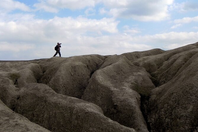 Private Bucharest Muddy Volcanoes and Unirea Salt Mine Tour - Tour Description