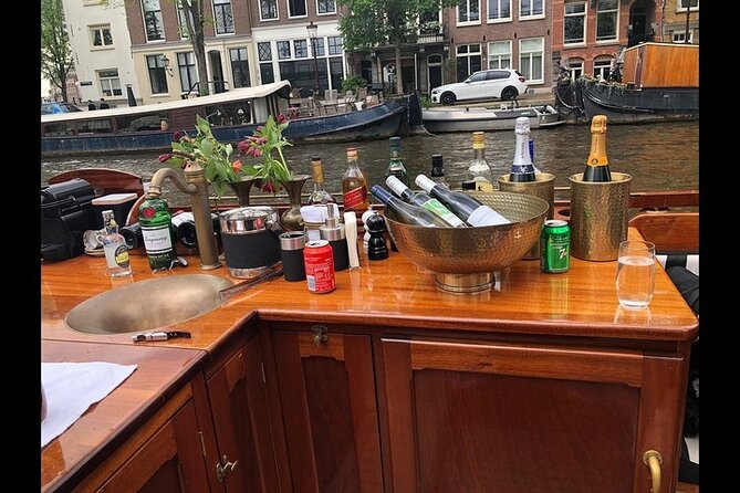 Private Canal Serenity: Morning/Afternoon Tea Cruise in Amsterdam - Pricing and Guarantee