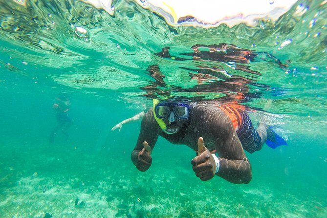 Private Catamaran Tour to Isla Mujeres with Snorkeling from Cancun - The Sum Up