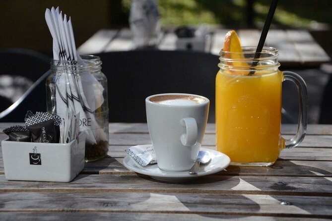 Private City Tour With Breakfast or Afternoon Coffee in Alcazar Gardens - The Sum Up