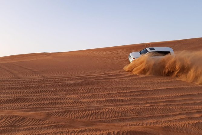 Private Desert Safari Red Dune With BBQ, Sand Boarding and Camel Ride - The Sum Up