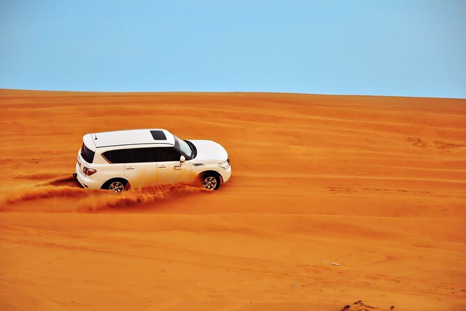 Private Desert Safari, Sand Board, Camel Ride & BBQ Dinner - Convenient Round-Trip Transportation