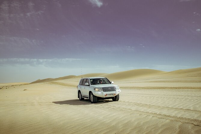 Private Desert Safari With Inland Sea Visit & Sand Boarding - Experience Highlights