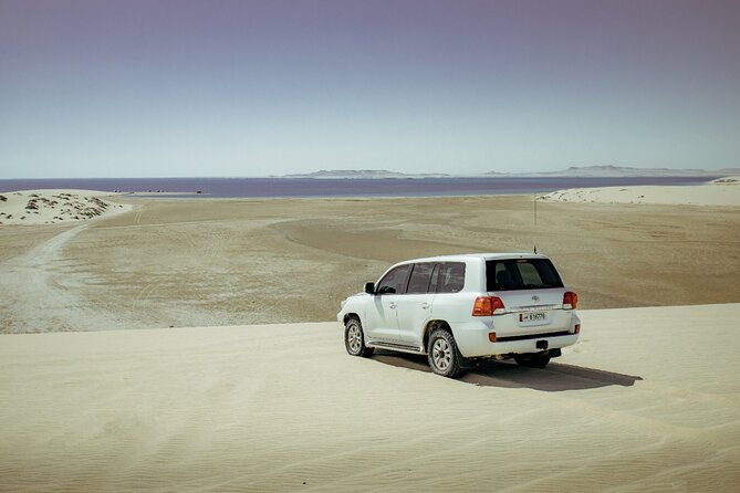Private Desert Safari With Inland Sea Visit & Sand Boarding - Itinerary Overview