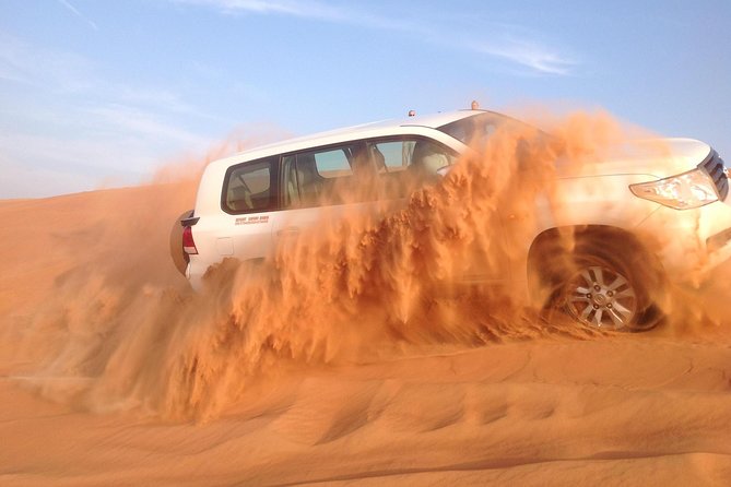 Private Desert Sandboarding Camel Riding and Dune Bashing - Cancellation Policy
