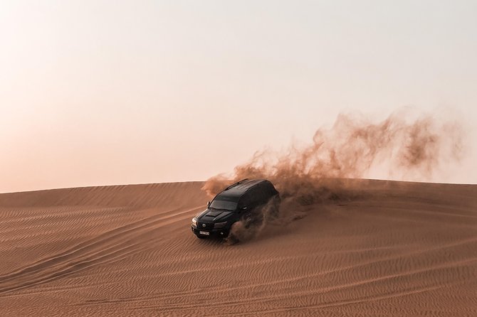 Private Evening in Red Dunes of Dubai With Dinner - Sunset Over the Desert