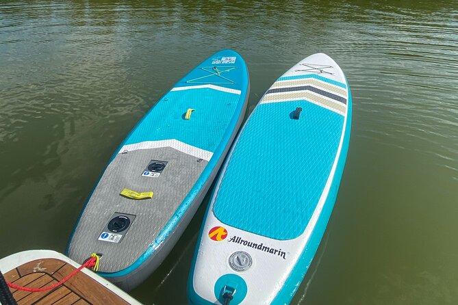 Private Guided Stand-Up Paddling Activity by Motorboat - Confirmation and Accessibility Details for the Activity