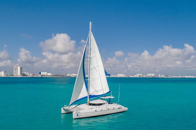 Private Isla Mujeres Catamaran Tour - Manta Boat - for up to 40 People - The Sum Up