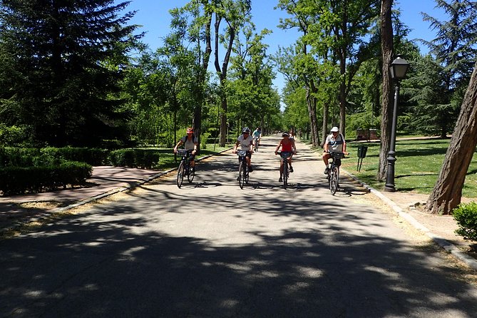 Private Madrid City Tour Bike or E-Bike Exclusive Guided Tour - Meeting and Pickup