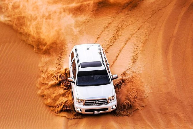 Private Red Dune Desert Safari With Extensive Bab Al Shams Dinner - Inclusions and Cancellation Policy