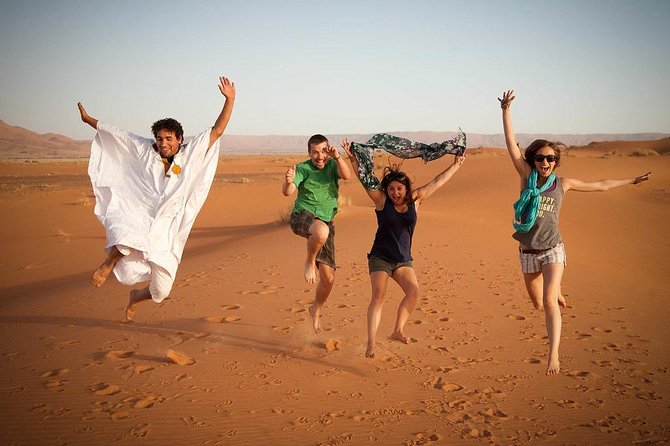 Private Red Sand Desert Safari With Camel Ride and Sand Boarding - Overview and Activities