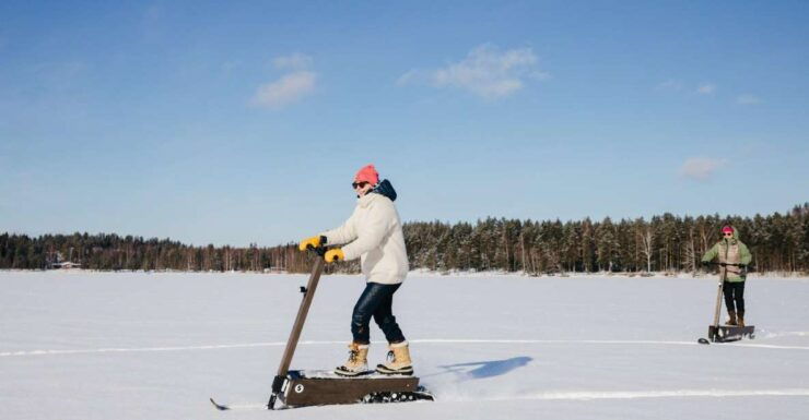 Private Safari by Electric Snow Scooters in Puumala - Magical Finnish Winter Experience