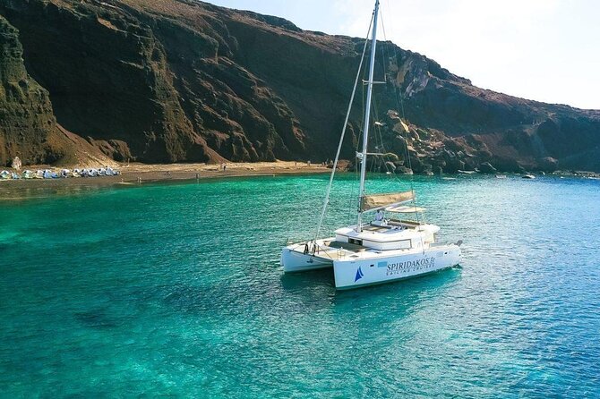Private Sailing Catamaran in Santorini With BBQ Meal and Drinks - Boarding at Vlychada Port