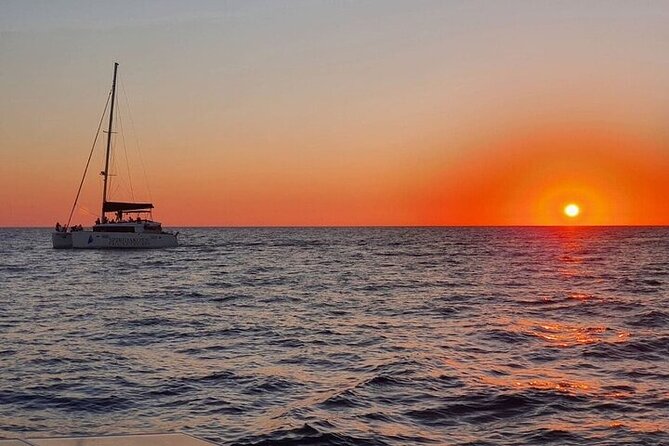 Private Sailing Catamaran in Santorini With BBQ Meal and Drinks - Visiting the Red Beach and White Beach