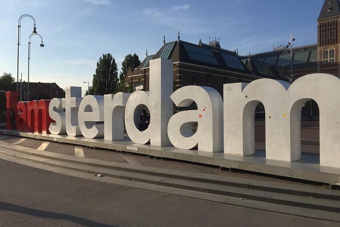 Private Taxi Transfer From Bruges to Amsterdam - English-Speaking Drivers