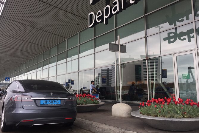 Private Tesla Taxi From Delft to Schiphol Amsterdam Airport - Overview and Inclusions