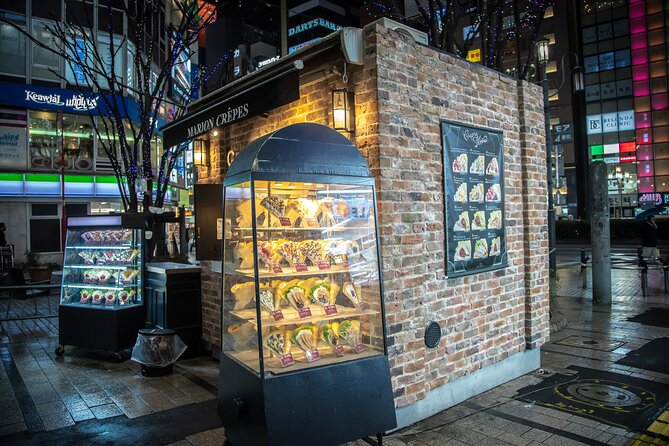 Private Tour in Shinjuku With a Spanish-Speaking Photographer - Pricing and Booking