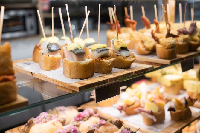 Private Tour Tapas & Traditions: A Culinary Journey in Seville - Inclusions and Highlights