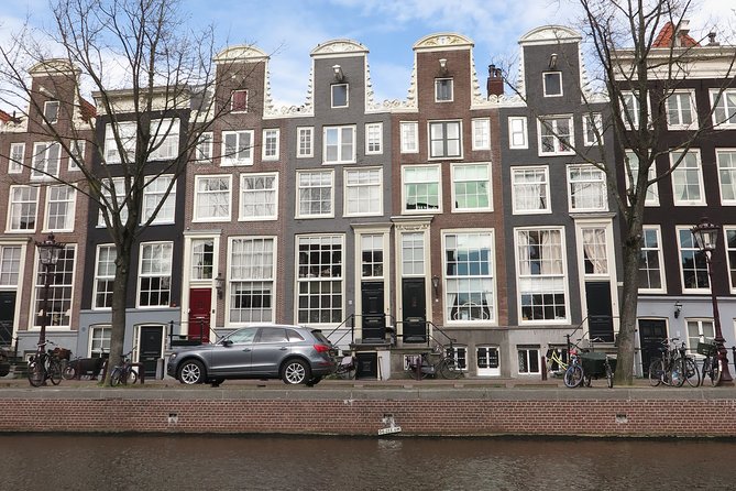 Private Walking Tour in Jordaan and Amsterdam Center - Price and Booking