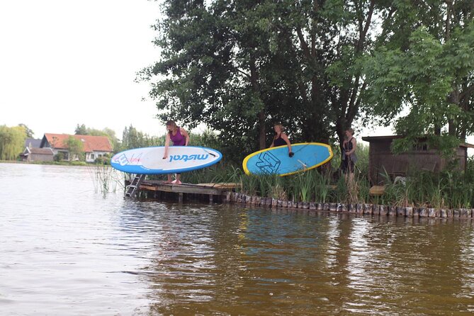 Private Yoga Stand Up Paddle Experience in Reeuwijk - Learning Yoga Poses on a Paddleboard